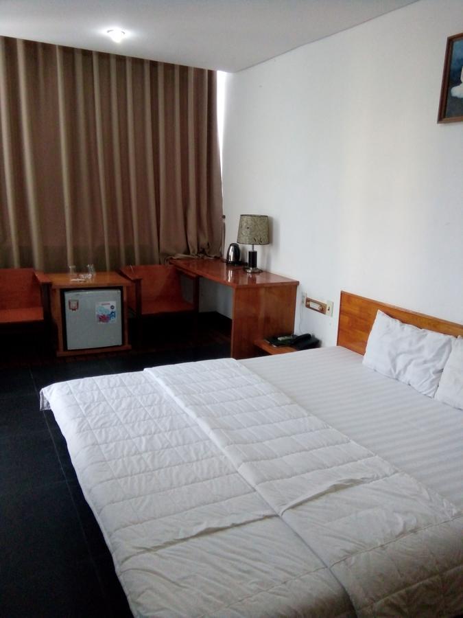 Отель Khach San Thuong Mai Yen Thinh Экстерьер фото